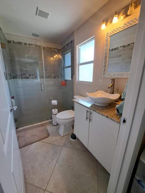 1371 Woodcrest Road, West Palm Beach FL - photo 8 of 27