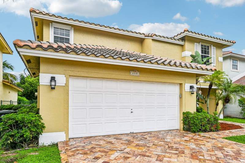 4 bedroom Single Family Residence at 6520 NW 41st Terrace, Cocobay, Coconut Creek — photo 3