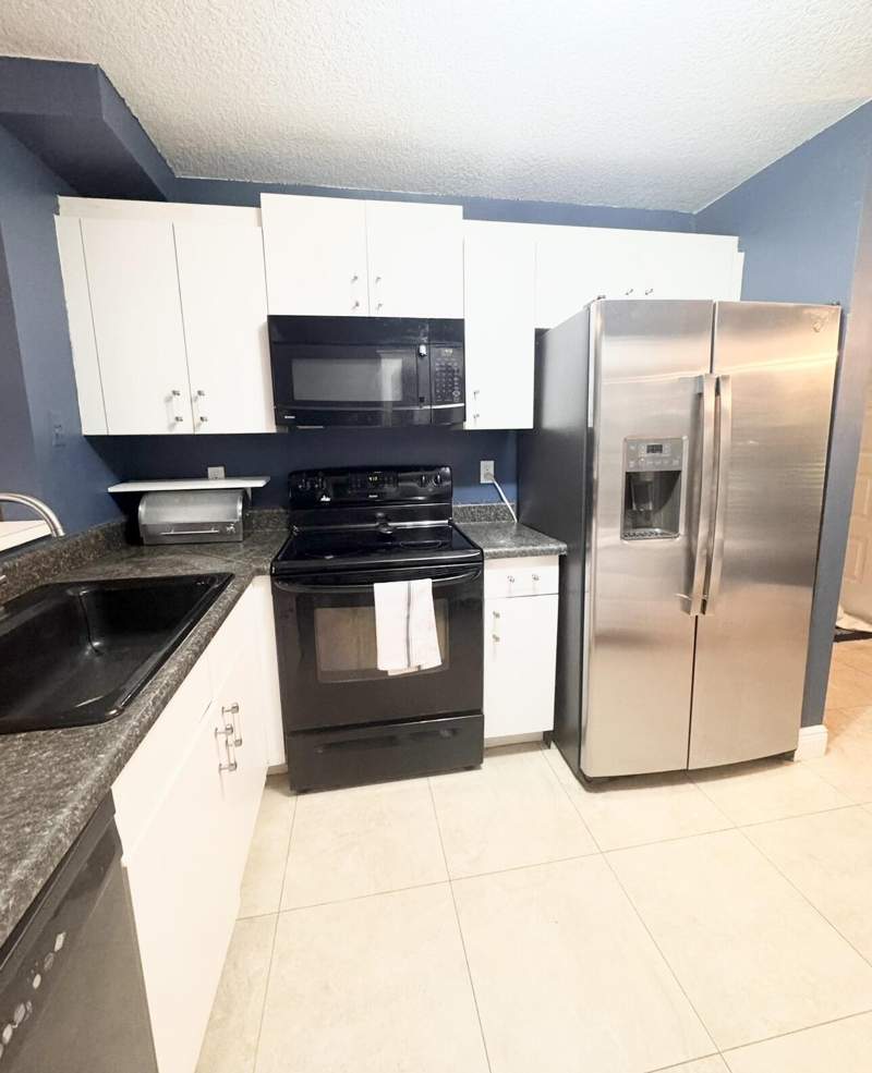 3 bedroom Townhouse at 949 Honeytree Lane #A, Emerald Forest Of Wellington, Wellington — photo 2