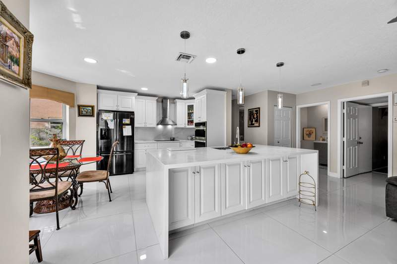 5 bedroom Single Family Residence at 7308 N Nautica Way, Spinnaker Bay At Lake Charleston, Lake Worth — photo 5