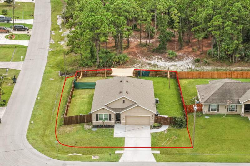 4 bedroom Single Family Residence at 1602 SW Lofgren Avenue, Port St Lucie Section 19, Port St. Lucie — photo 3