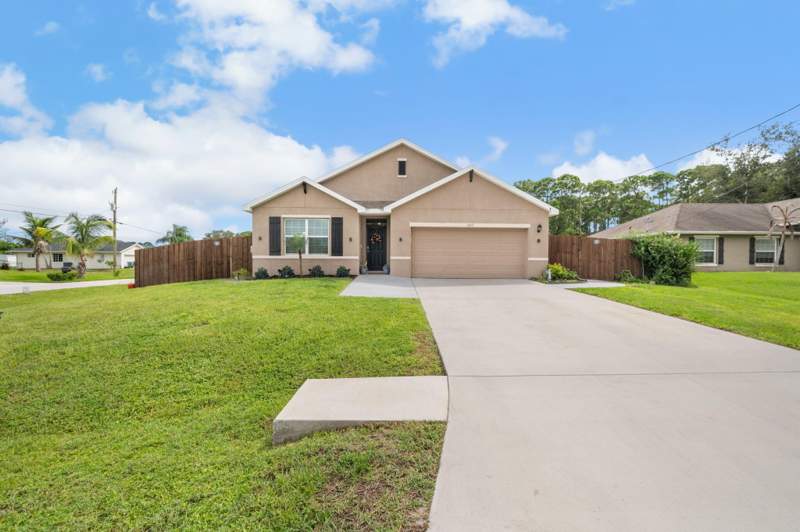 4 bedroom Single Family Residence at 1602 SW Lofgren Avenue, Port St Lucie Section 19, Port St. Lucie — photo 2