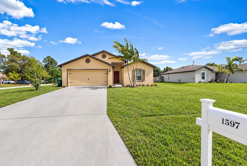 5 bedroom Single Family Residence at 1597 SW Leisure Lane, Port St Lucie Section 11, Port St. Lucie — photo 2