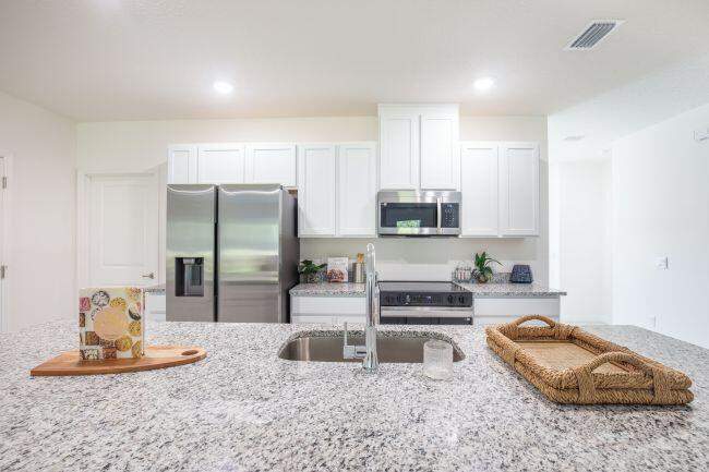 4 bedroom Single Family Residence at 6447 NW Hemlock Street, Port St Lucie Section 44, Port St. Lucie — photo 3