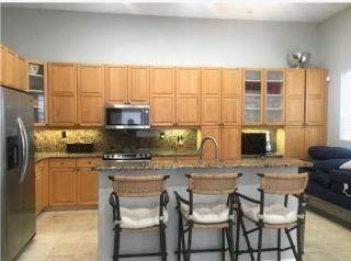 4 bedroom Single Family Residence at 1115 Papaya Street, West Lake Village Plat, Hollywood — photo 2