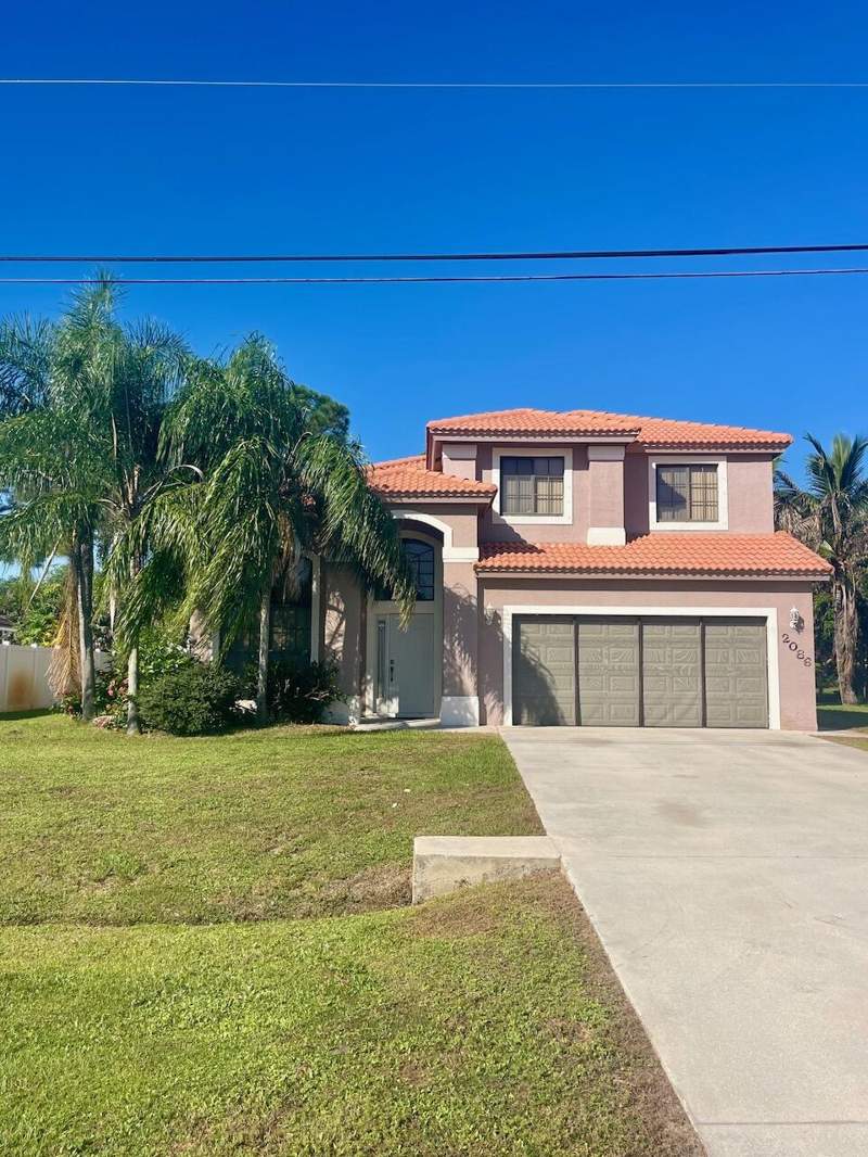 4 bedroom Single Family Residence at 2086 SW Savage Boulevard, Port St Lucie Section 31, Port St. Lucie — photo 2
