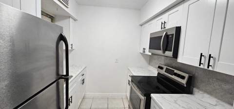12005 Poinciana Boulevard #102, Royal Palm Beach FL - photo 7 of 67