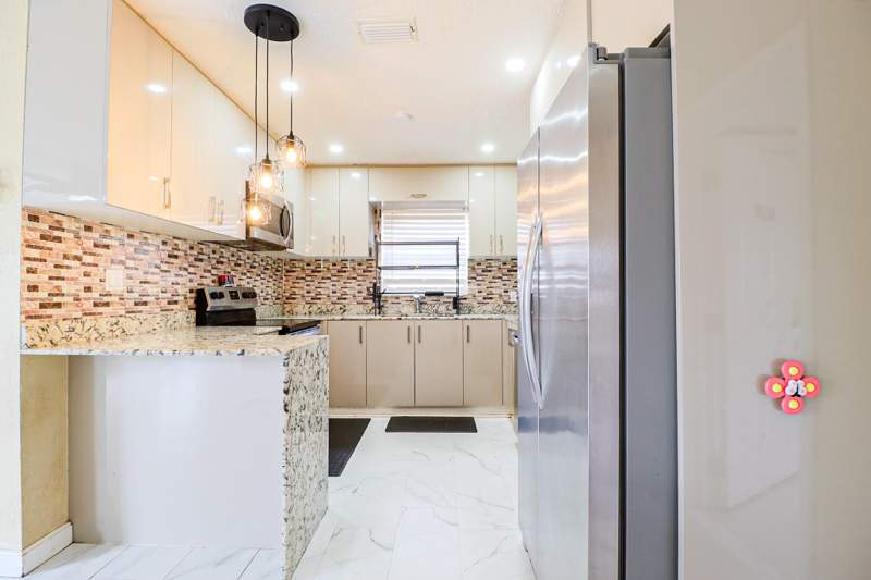 4 bedroom Single Family Residence at 219 NE 6th Avenue, Sutton Manor, Boynton Beach — photo 2