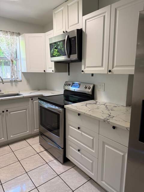 12053 Colony Avenue, Palm Beach Gardens FL - photo 9 of 31