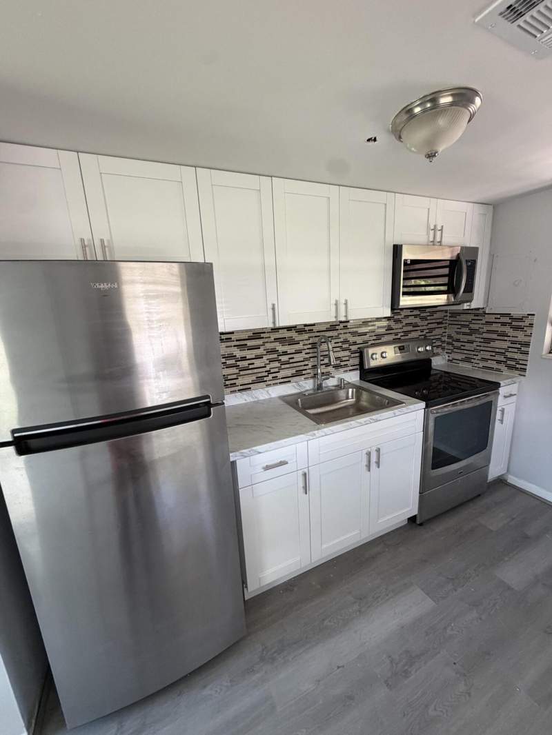 3 bedroom Single Family Residence at 1501 Osceola Drive, West Gate Estates Northern, Westgate — photo 2