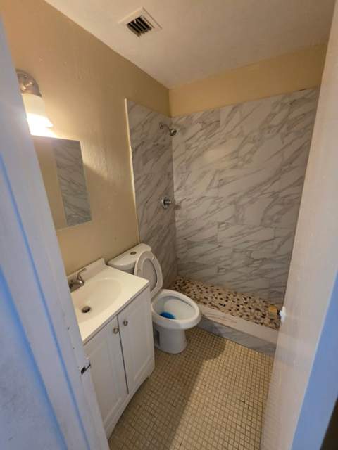 1216 Giller Avenue, Mangonia Park FL - photo 11 of 16