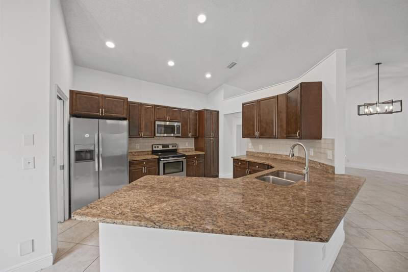 4 bedroom Single Family Residence at 13787 Exotica Lane, Sugar Pond Manor Of Wellington, Wellington — photo 4