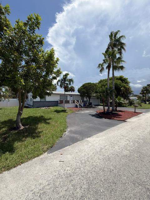 3 bedroom Single Family Residence at 3040 Tropical Trail, Hypoluxo Village 1, Lake Worth — photo 2