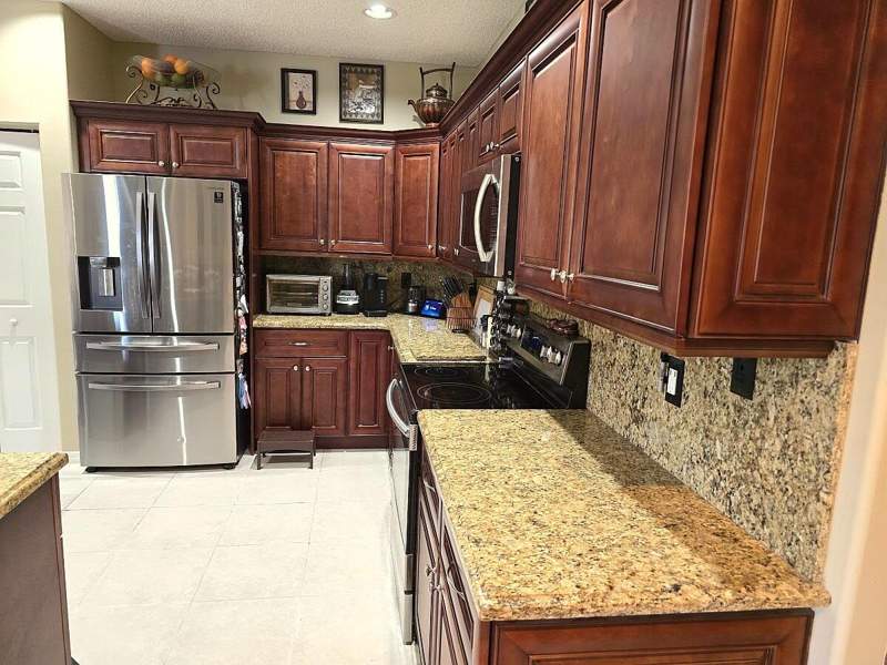 4 bedroom Single Family Residence at 5359 NW 119th Terrace, Wyndham Lakes North, Coral Springs — photo 3