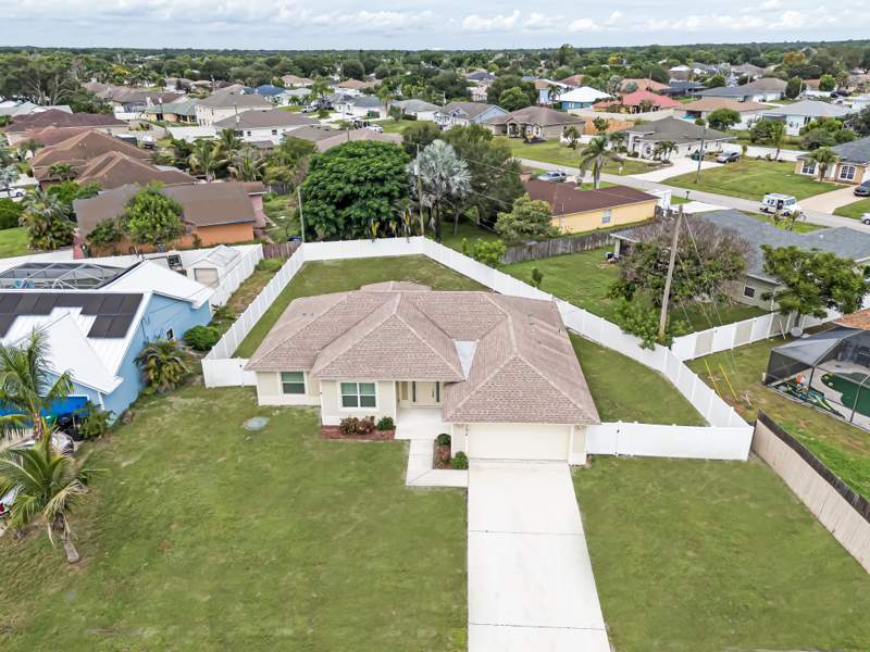 4 bedroom Single Family Residence at 3874 SW McCrory Street, Port St Lucie Section 33, Port St. Lucie — photo 2