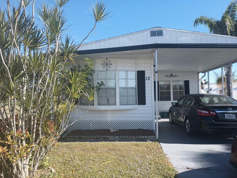 2 bedroom Manufactured Home at 12 Universidad Lane, Spanish Lakes Riverfront, Port St. Lucie — photo 2