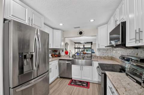 7099 Pine Manor Drive, Lake Worth FL - photo 7 of 54