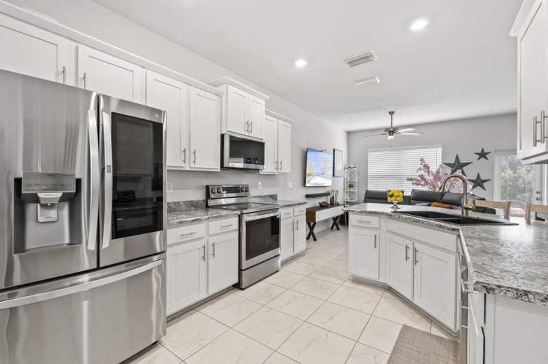5 bedroom Single Family Residence at 861 NE Whistling Duck Way, River Place - Little Turtle, Port St. Lucie — photo 5
