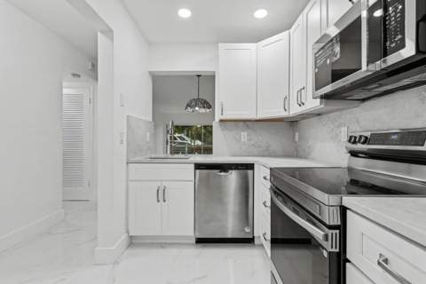 460 Paradise Isle Boulevard #101, Hallandale Beach FL - photo 8 of 57