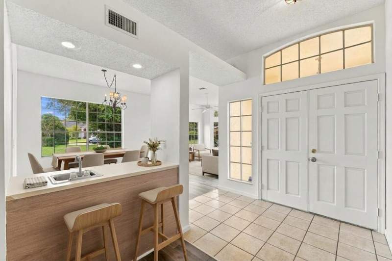 4 bedroom Single Family Residence at 1015 Lake Breeze Drive, Emerald Forest Of Wellington, Wellington — photo 4