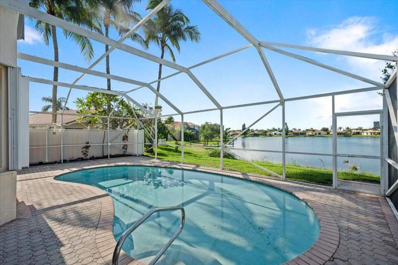 4 bedroom Single Family Residence at 7639 Northtree Club Drive, Hidden Lakes At Northtree, Greenacres — photo 4