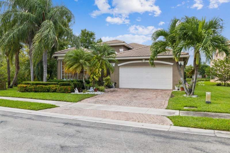 4 bedroom Single Family Residence at 5521 Albin Drive, Nautica Isles West 3, Greenacres — photo 2