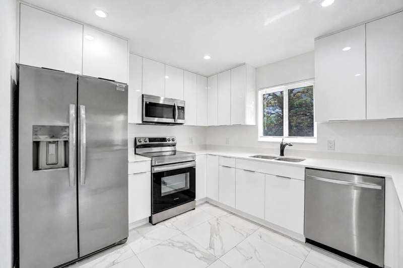 4 bedroom Single Family Residence at 830 NW 19th Terrace, Durrs Sub, Fort Lauderdale — photo 5