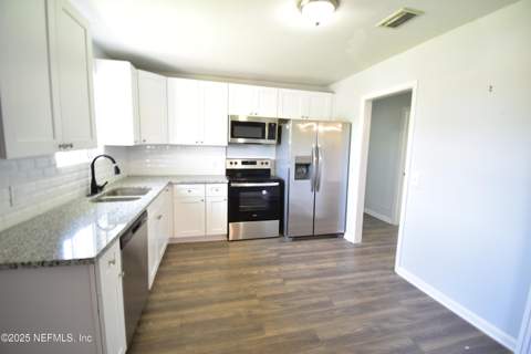 3037 Ribault Scenic Drive, Jacksonville FL - photo 8 of 31