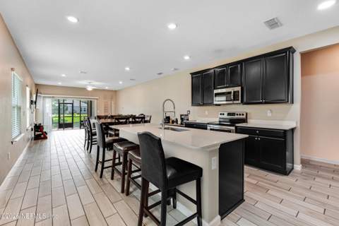 7361 Hilladale Creek Lane, Jacksonville FL - photo 7 of 31
