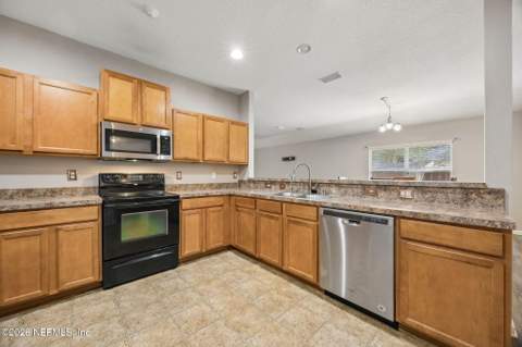 15763 Twin Creek Drive, Jacksonville FL - photo 10 of 46
