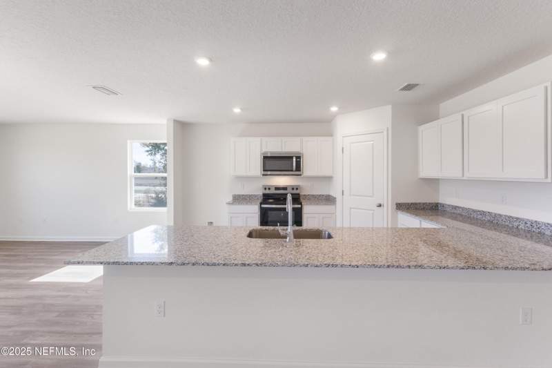 4 bedroom Single Family Residence at 10430 Greystone Drive, Greystone, Glen St. Mary — photo 4