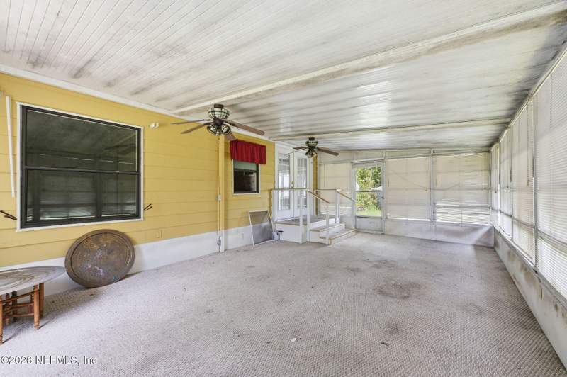 2 bedroom Manufactured Home at 100 ALLIGATOR Circle, Metes & Bounds, Crescent City — photo 2