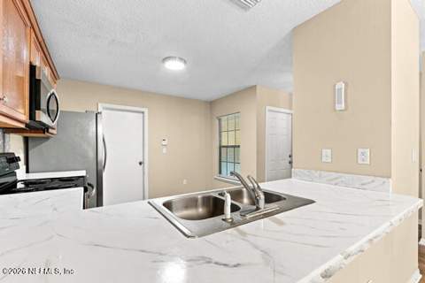 7705 Highchair Lane, Jacksonville FL - photo 11 of 31