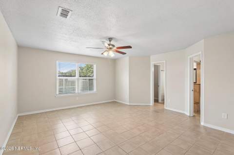 8446 Sand Point Drive, Jacksonville FL - photo 9 of 36