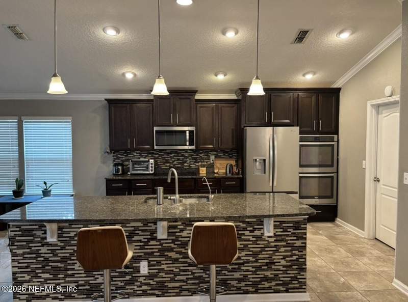 4 bedroom Single Family Residence at 15808 Baxter Creek Drive, Bainebridge Estates, Jacksonville — photo 5