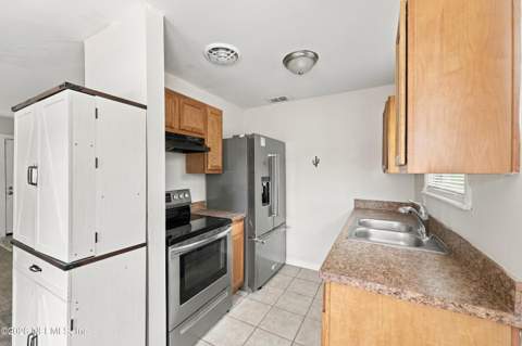 7328 Warner Drive, Jacksonville FL - photo 13 of 36