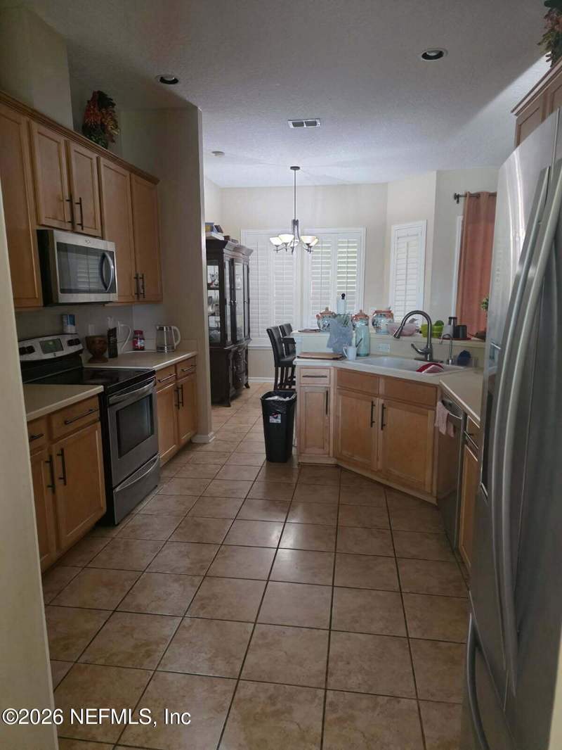 4 bedroom Single Family Residence at 7811 E Chase Meadows Drive, Southchase, Jacksonville — photo 3