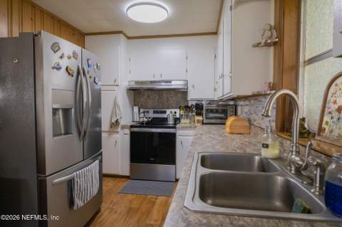 105 Paradise Circle, Crescent City FL - photo 13 of 60