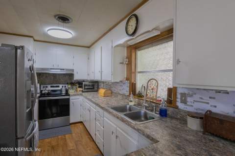 105 Paradise Circle, Crescent City FL - photo 11 of 60