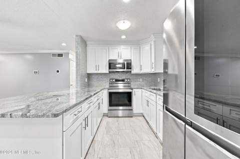 6054 Toyota Drive, Jacksonville FL - photo 8 of 36
