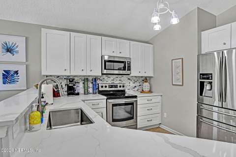 1382 Eastwind Drive, Jacksonville Beach FL - photo 9 of 32
