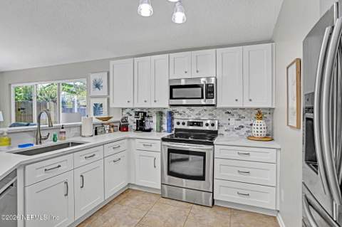 1382 Eastwind Drive, Jacksonville Beach FL - photo 7 of 32
