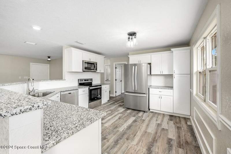 3 bedroom Single Family Residence at 1041 Braddock Avenue, Port Malabar Unit 12, Palm Bay — photo 4