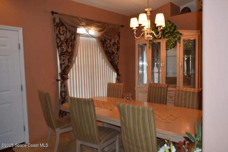 4 bedroom Single Family Residence at 999 Carver Road, Port Malabar Unit 10, Palm Bay — photo 3