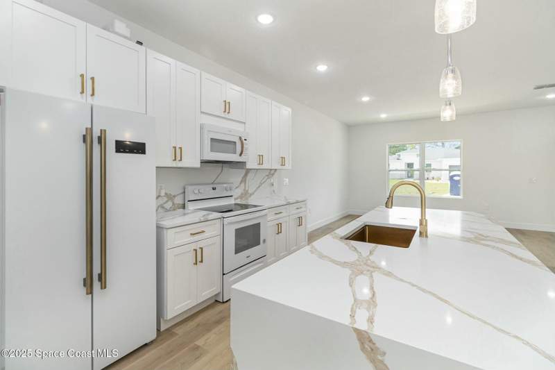 4 bedroom Single Family Residence at 435 Goldsmith Avenue, Port Malabar Country Club Unit 4, Palm Bay — photo 4