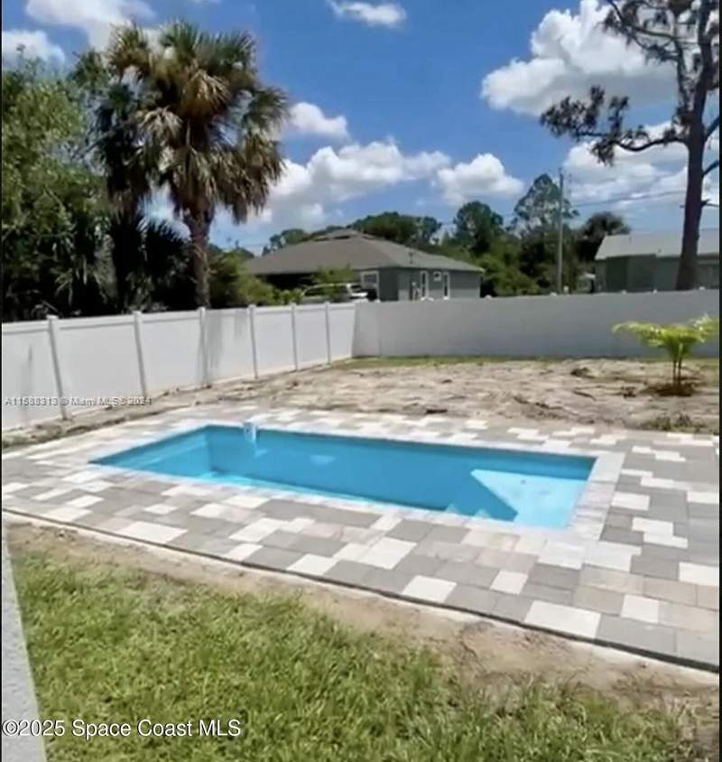 4 bedroom Single Family Residence at 435 Goldsmith Avenue, Port Malabar Country Club Unit 4, Palm Bay — photo 3