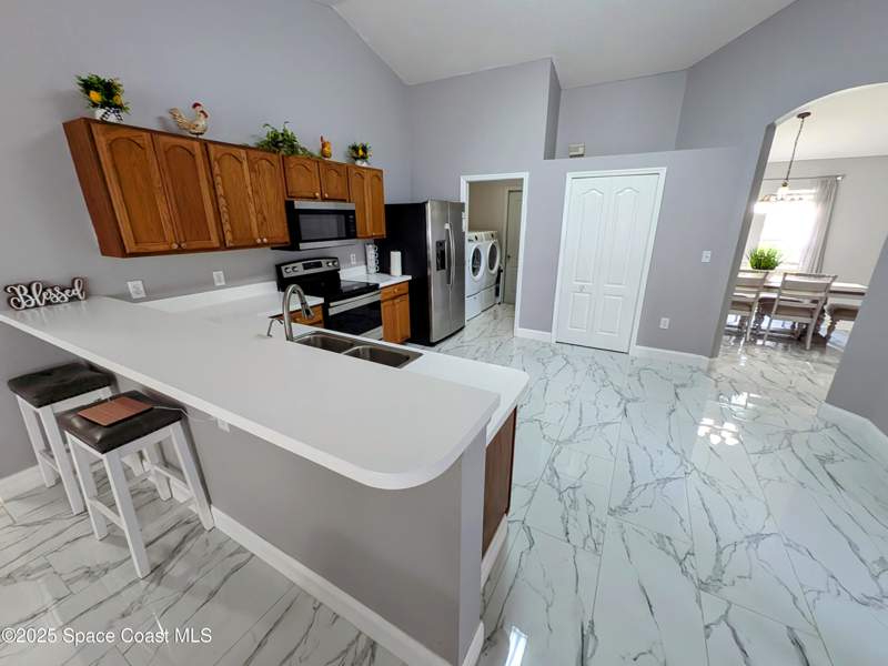 3 bedroom Single Family Residence at 872 Ravenswood Street, Port Malabar Unit 22, Palm Bay — photo 3