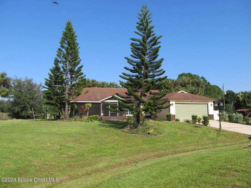 5 bedroom Single Family Residence at 1501 Olympia Avenue, Port Malabar Unit 32, Palm Bay — photo 2