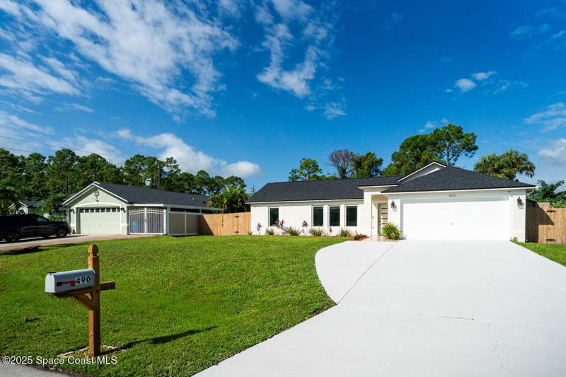 5 bedroom Single Family Residence at 490 Tillman Avenue, Port Malabar Unit 20, Palm Bay — photo 2