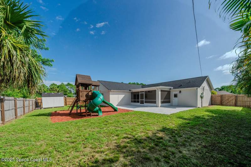5 bedroom Single Family Residence at 490 Tillman Avenue, Port Malabar Unit 20, Palm Bay — photo 4